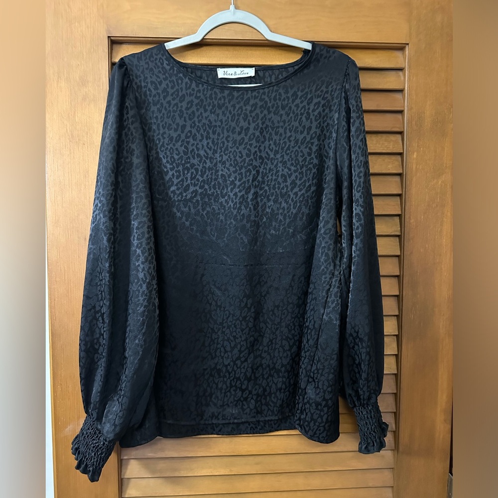 Black blouse with subtle leopard print